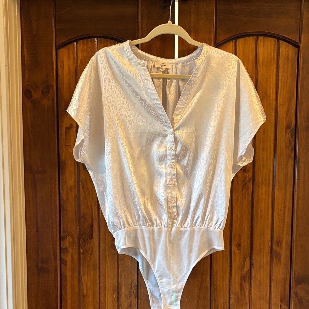 White leopard print body suit